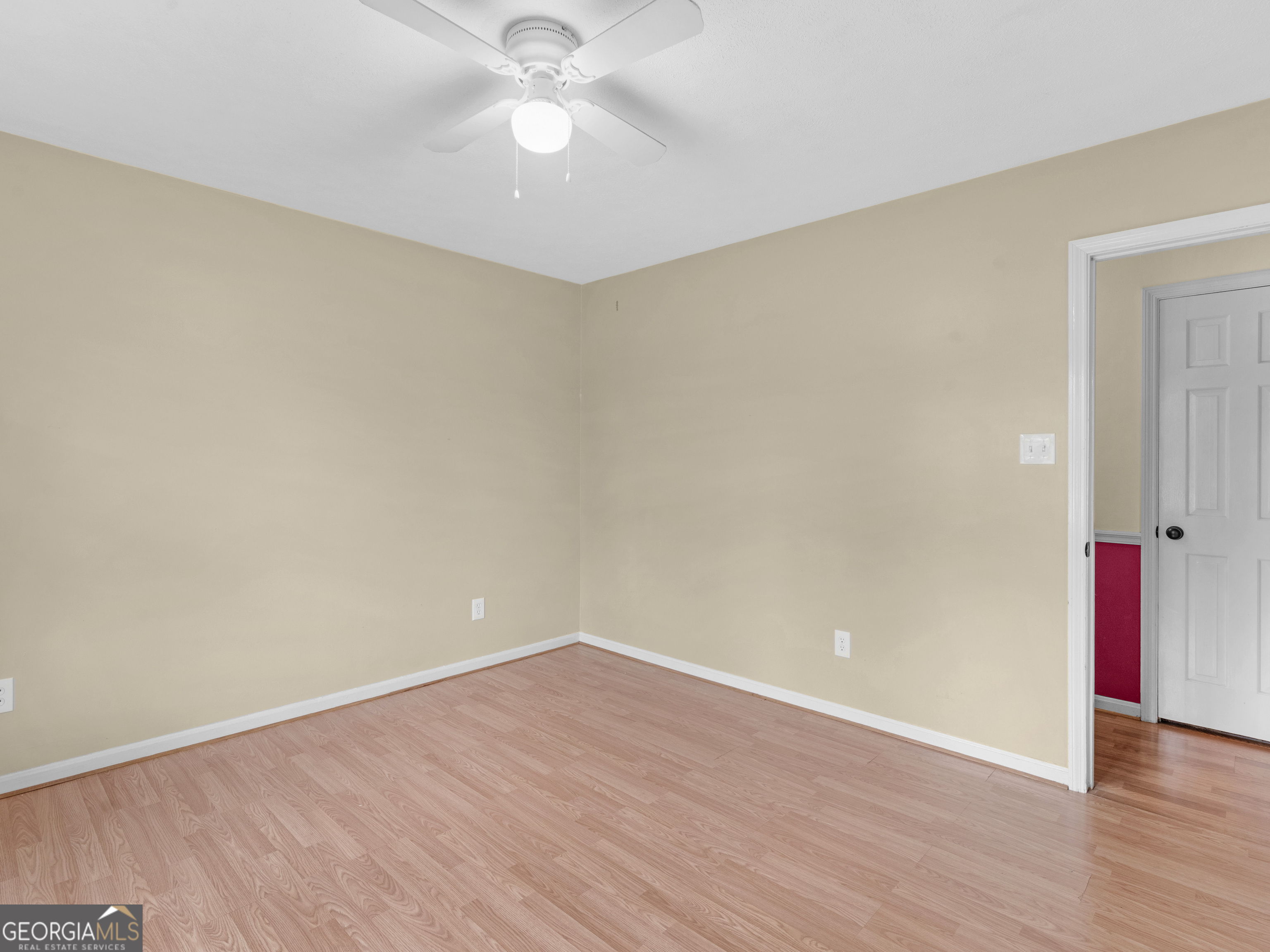 329 Pine Street Barnesville, GA 30204 - Photo 38 of 57 a view of an empty room with wooden floor