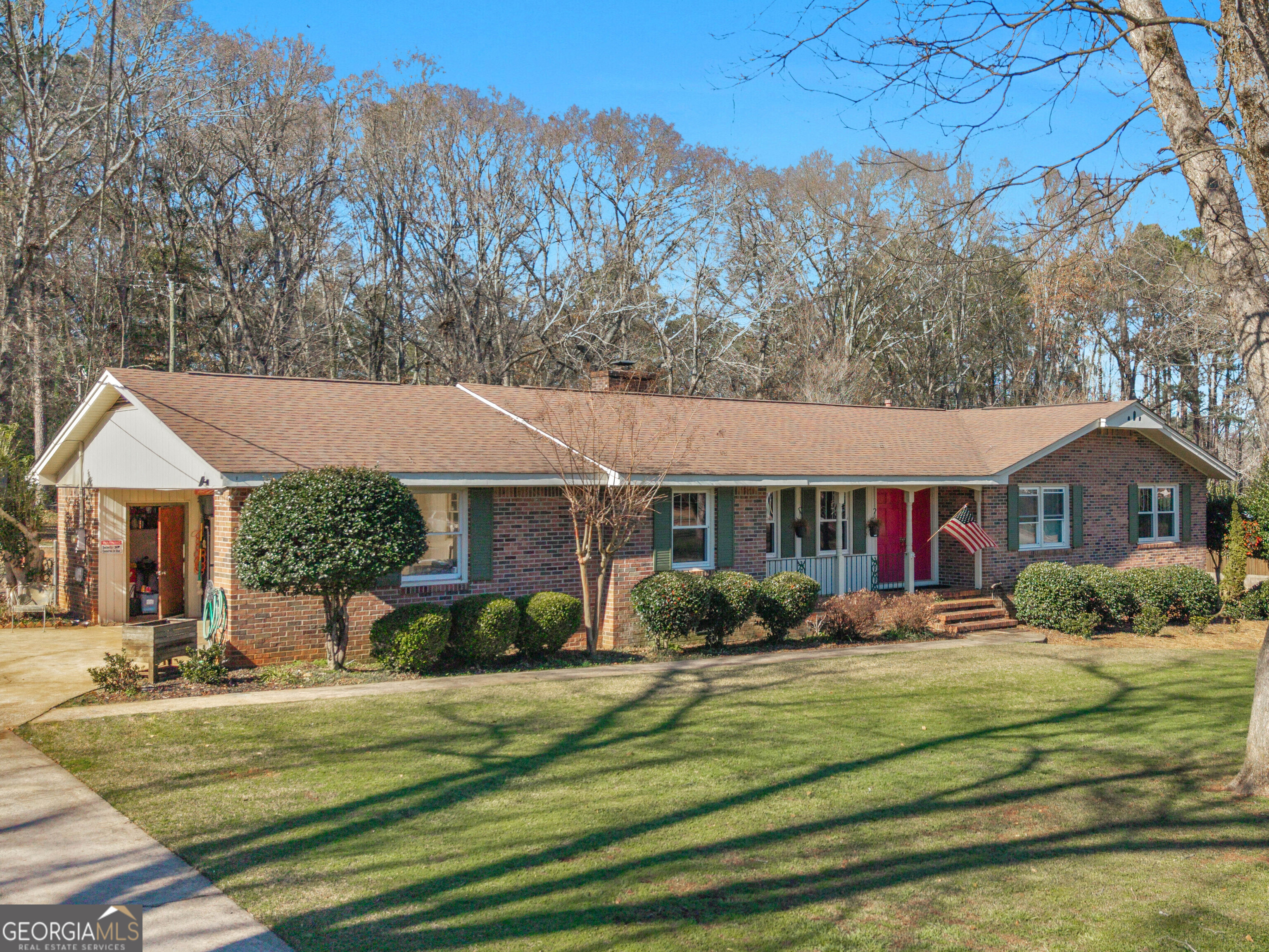 329 Pine Street Barnesville, GA 30204 - Photo 4 of 57 a front view of a house with garden