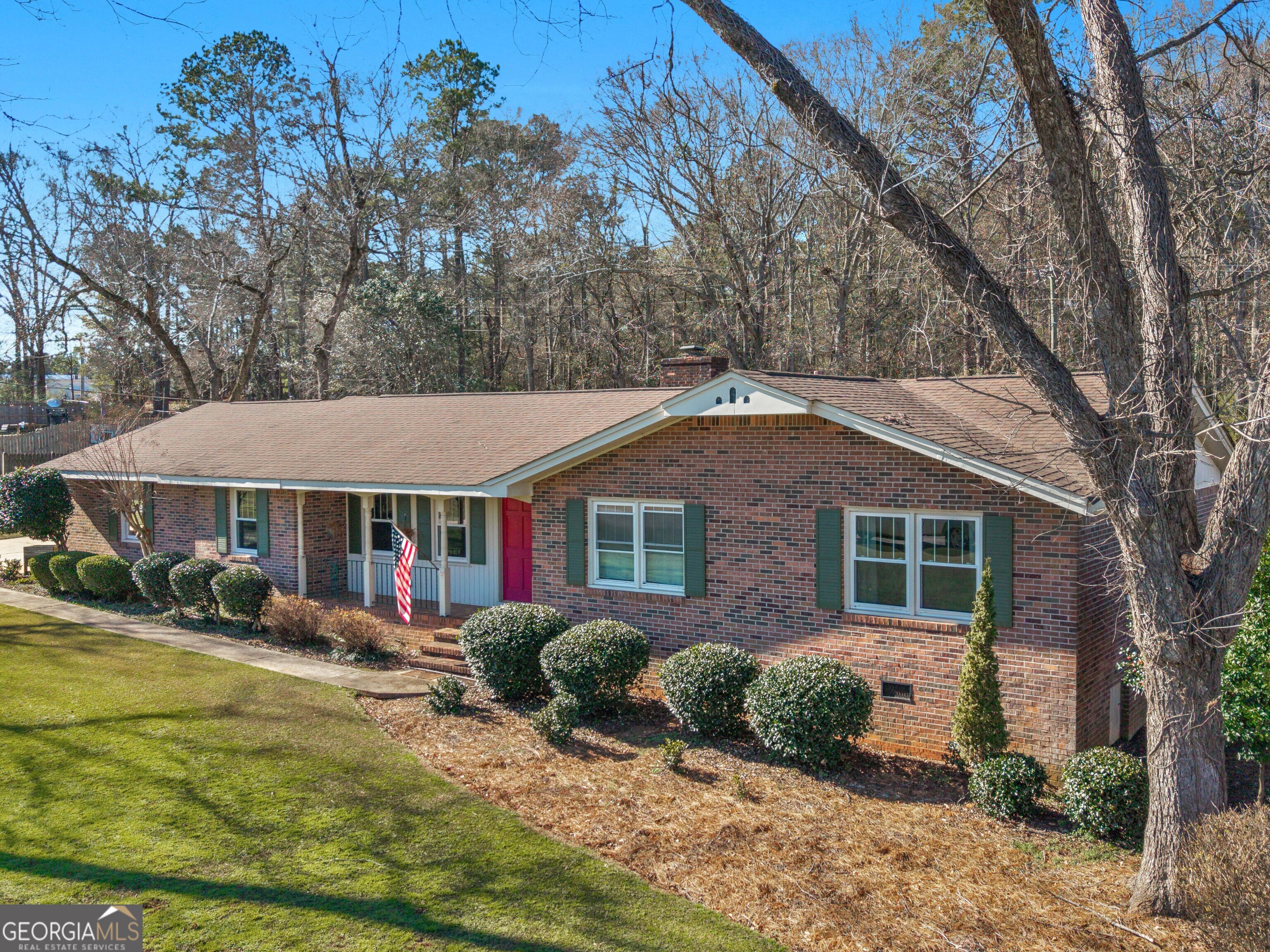 329 Pine Street Barnesville, GA 30204 - Photo 5 of 57 a front view of a house with garden