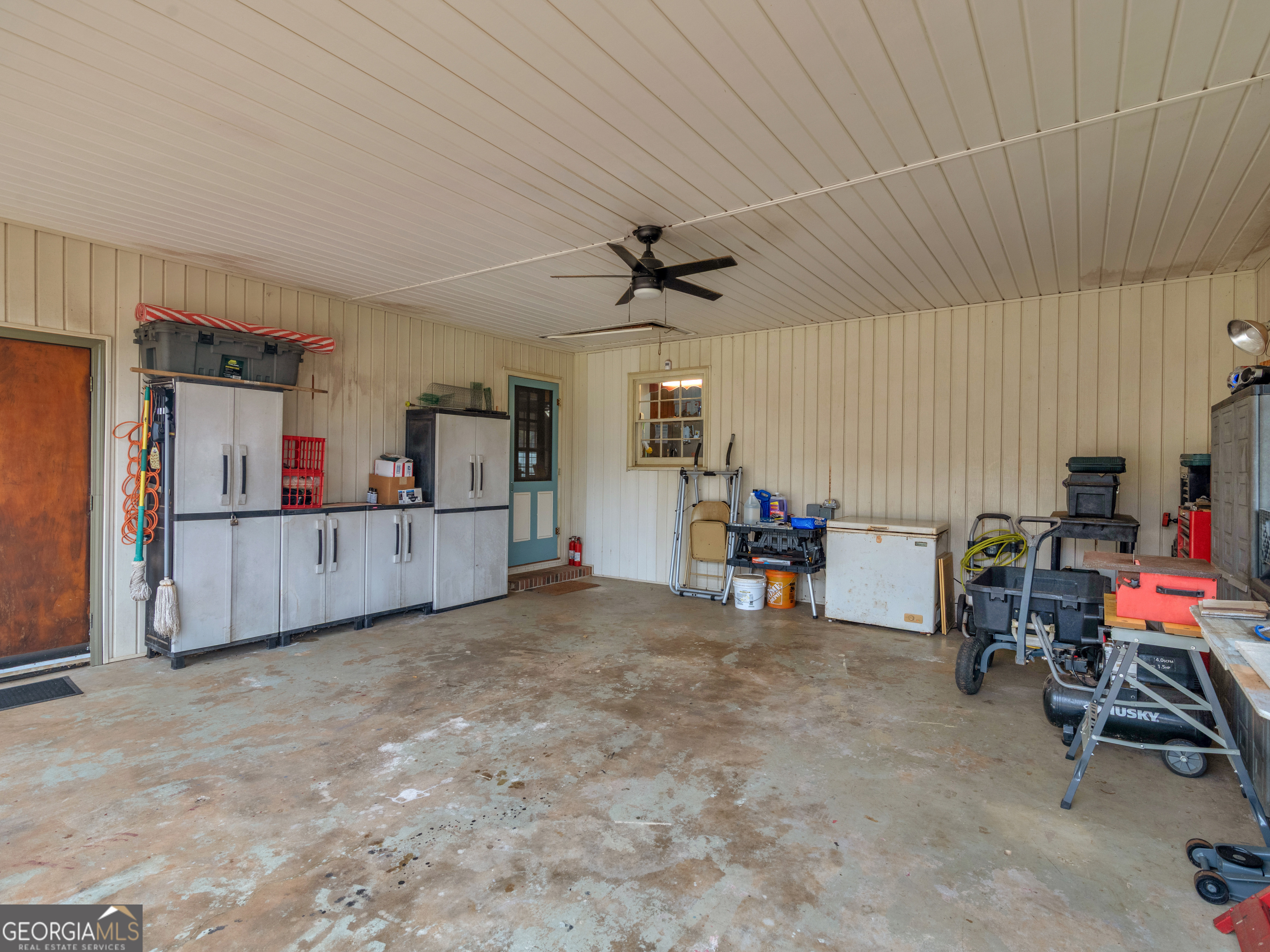 329 Pine Street Barnesville, GA 30204 - Photo 52 of 57 a view of a livingroom with furniture and a kitchen