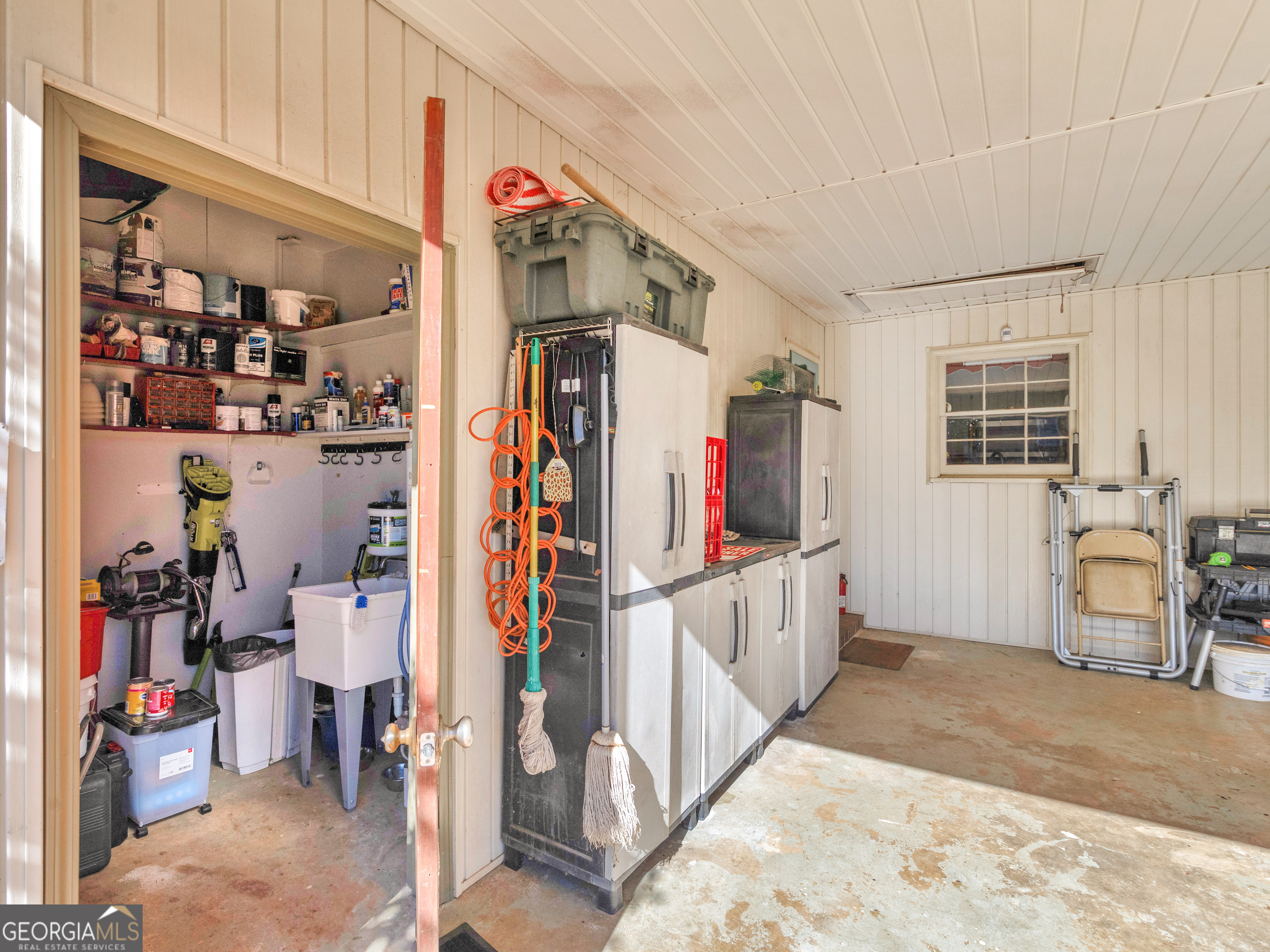 329 Pine Street Barnesville, GA 30204 - Photo 54 of 57 a view of walk in closet with clothes and shoes