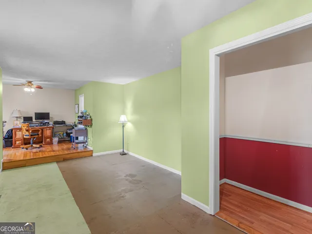 a view of a big room with wooden floor