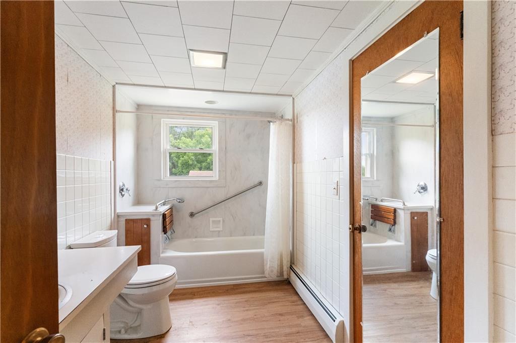 177 Oniontown Road Greenville, PA 16125 - Photo 8 of 18 a bathroom with a toilet and a shower