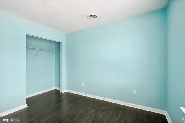 a view of small space with wooden floor