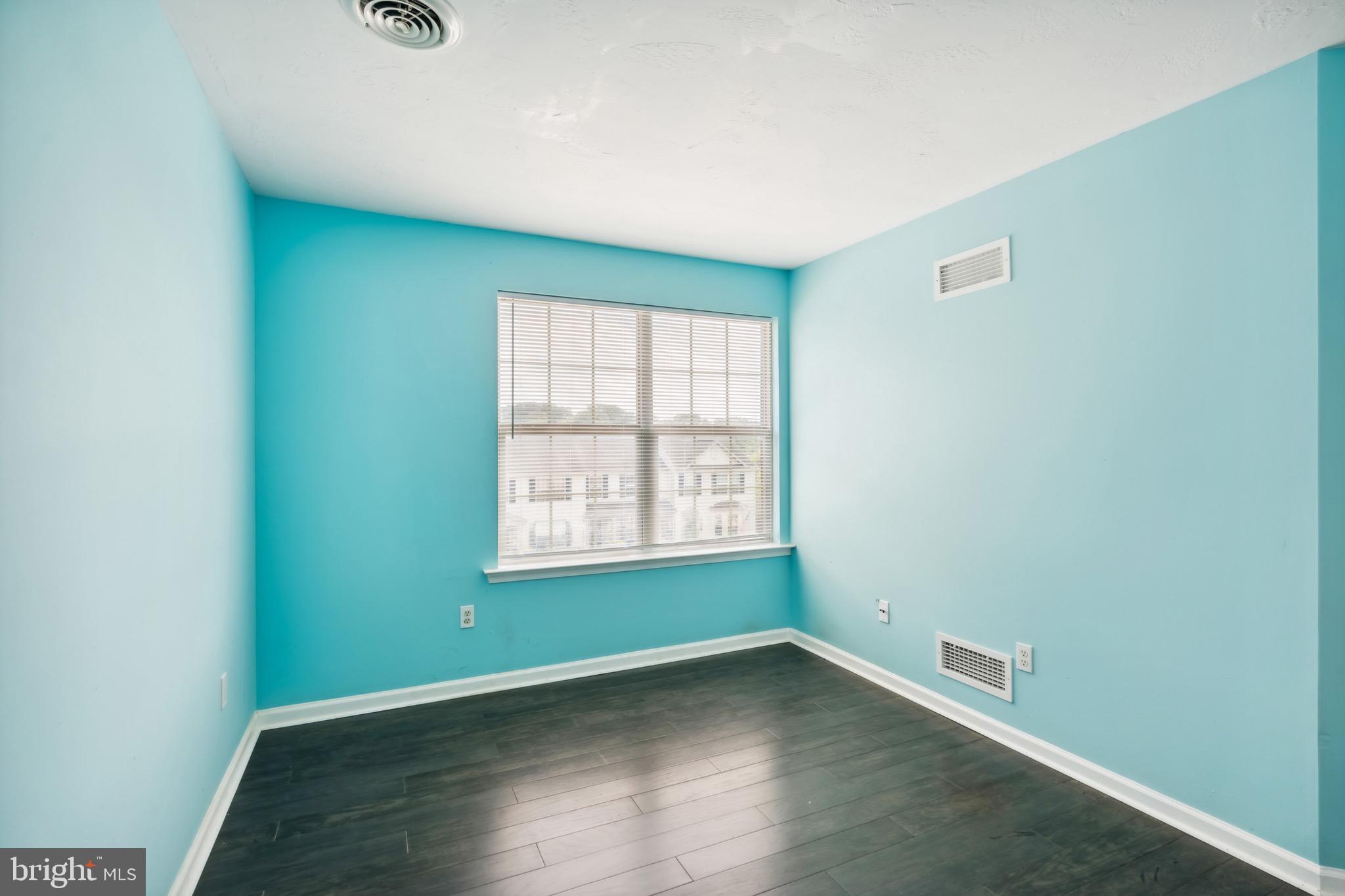 188 Sara Lane Hanover, PA 17331 - Photo 17 of 25 an empty room with wooden floor and windows