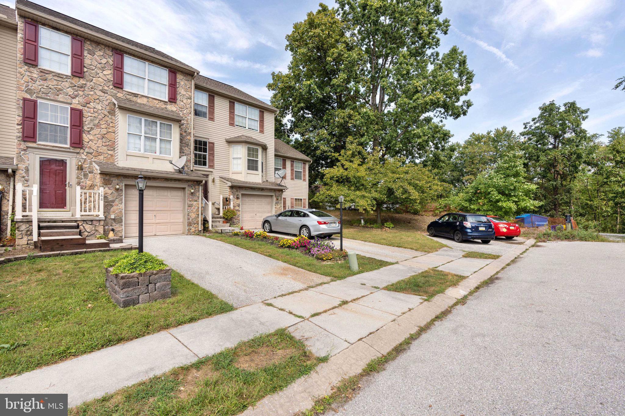 188 Sara Lane Hanover, PA 17331 - Photo 2 of 25 a car parked in front of brick building