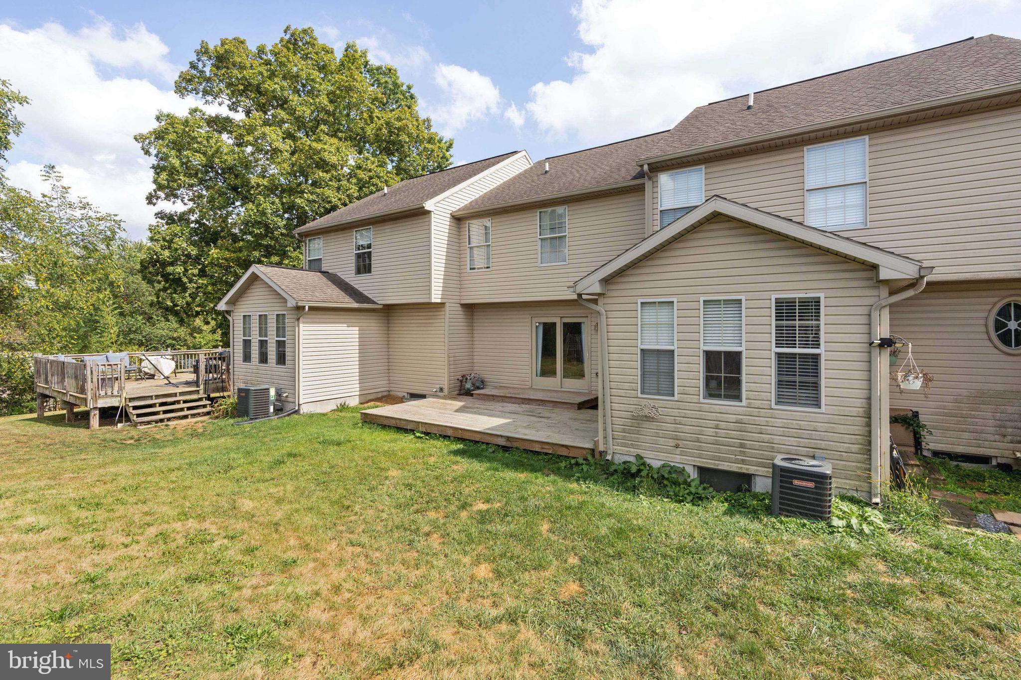 188 Sara Lane Hanover, PA 17331 - Photo 25 of 25 a view of a house with a yard and sitting area