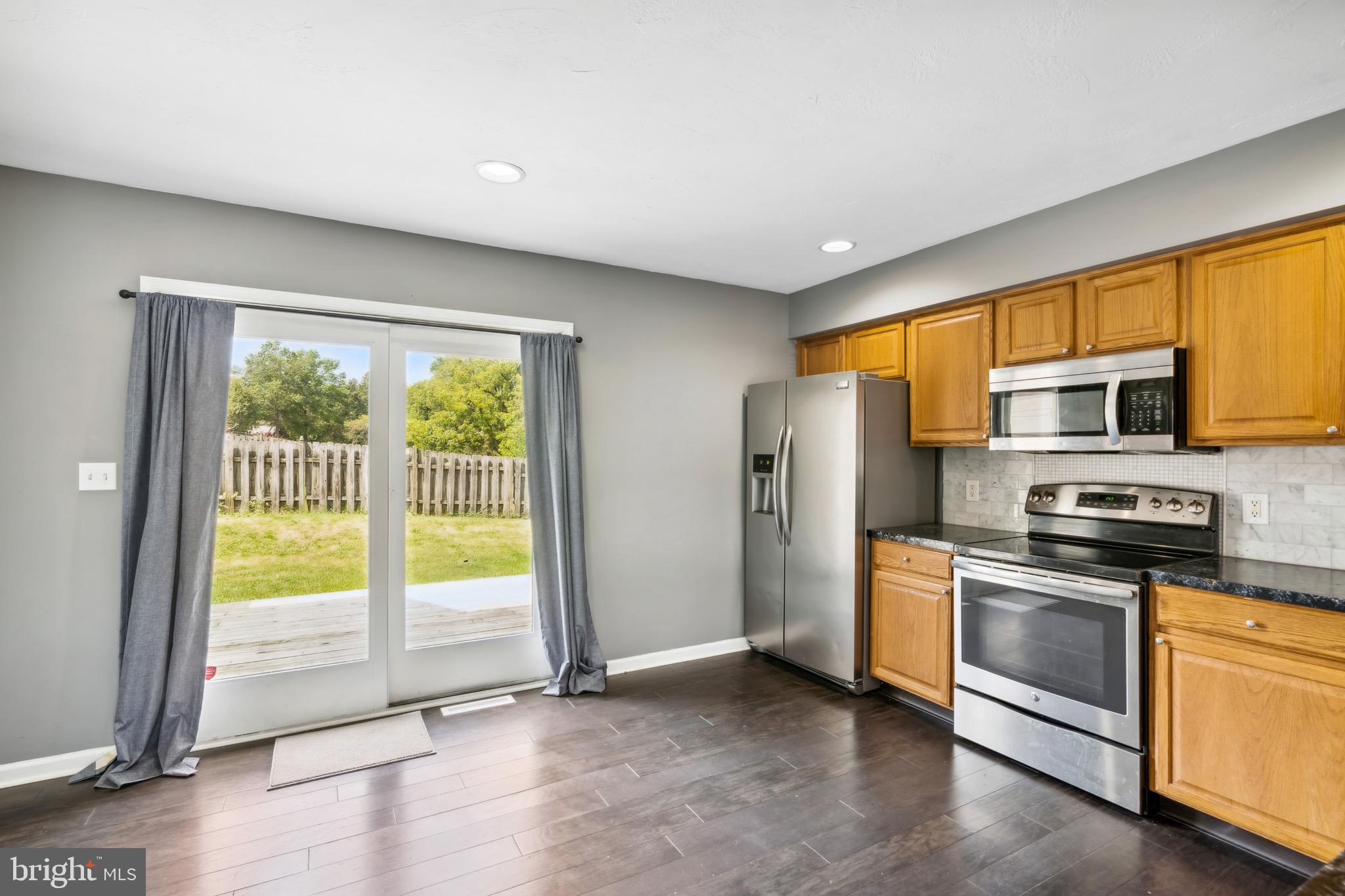 188 Sara Lane Hanover, PA 17331 - Photo 6 of 25 a kitchen with stainless steel appliances a refrigerator sink and stove