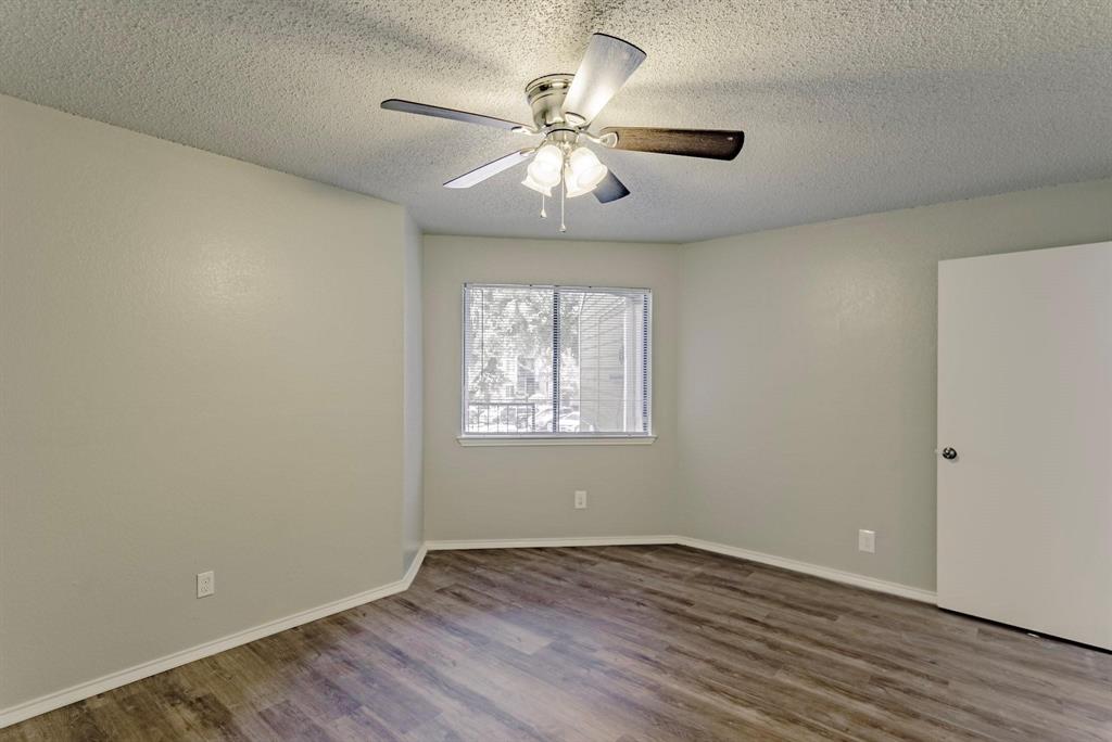 9823 Walnut Street, Unit L205 Dallas, TX 75243 - Photo 10 of 30 First floor bedroom
