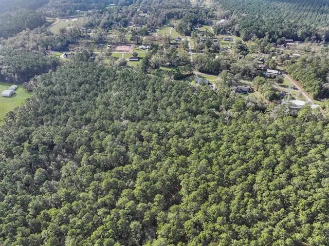 a view of a house with a street