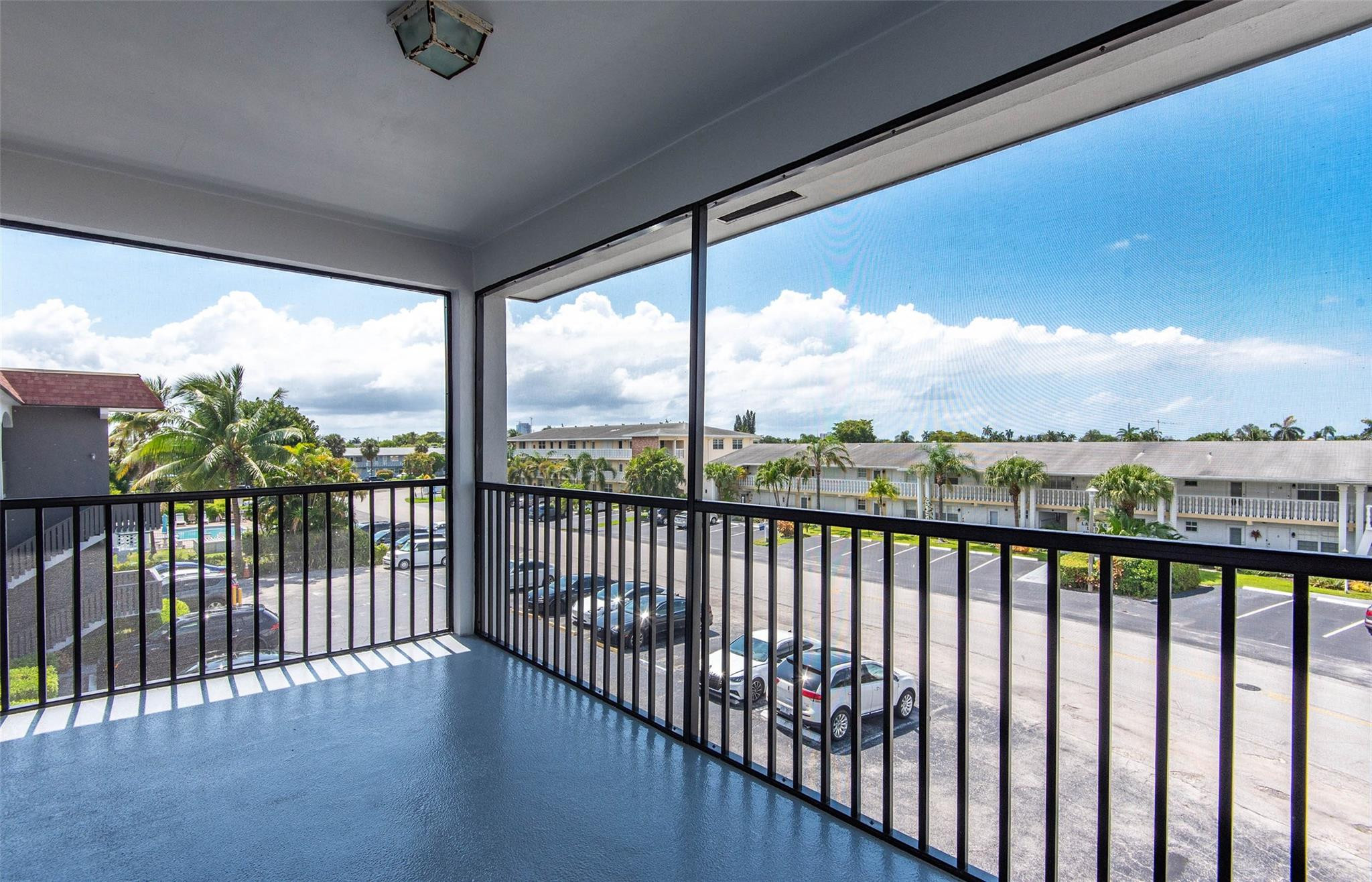 651 Pine Drive, Unit 306 Pompano Beach, FL 33060 - Photo 16 of 36 a view of city and mountain from a balcony
