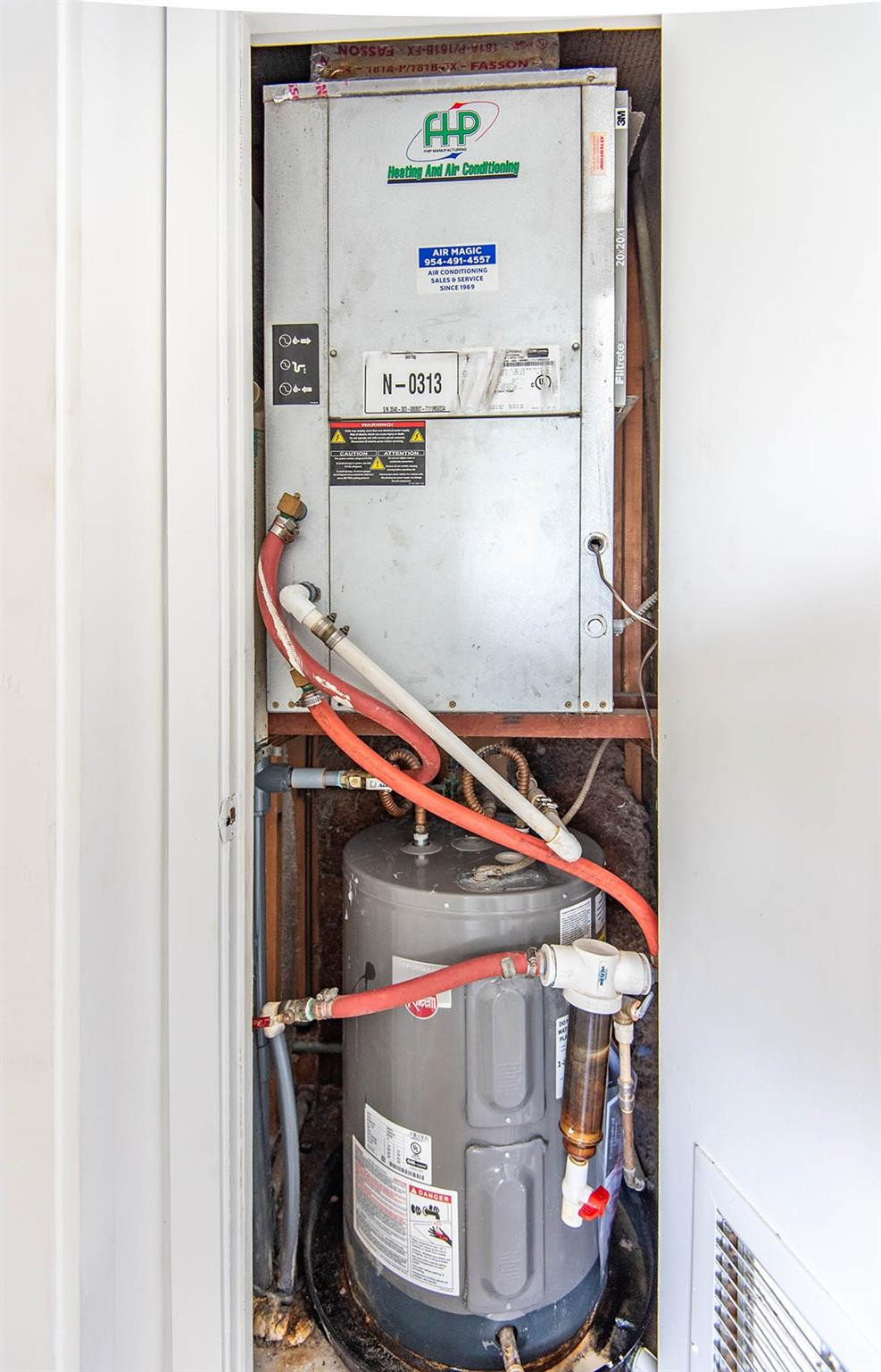 651 Pine Drive, Unit 306 Pompano Beach, FL 33060 - Photo 26 of 36 a utility room with washer and dryer