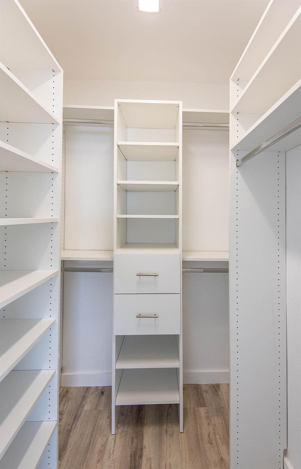651 Pine Drive, Unit 306 Pompano Beach, FL 33060 - Photo 33 of 36 a view of walk in closet with empty racks
