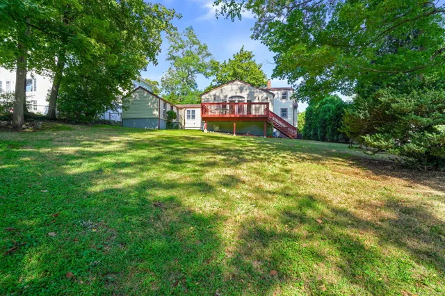 a view of a house with a small yard