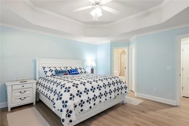 an aerial view of ocean with residential house and lake view