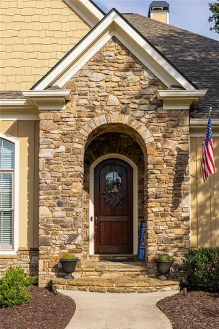 a view of a dining room with furniture and window