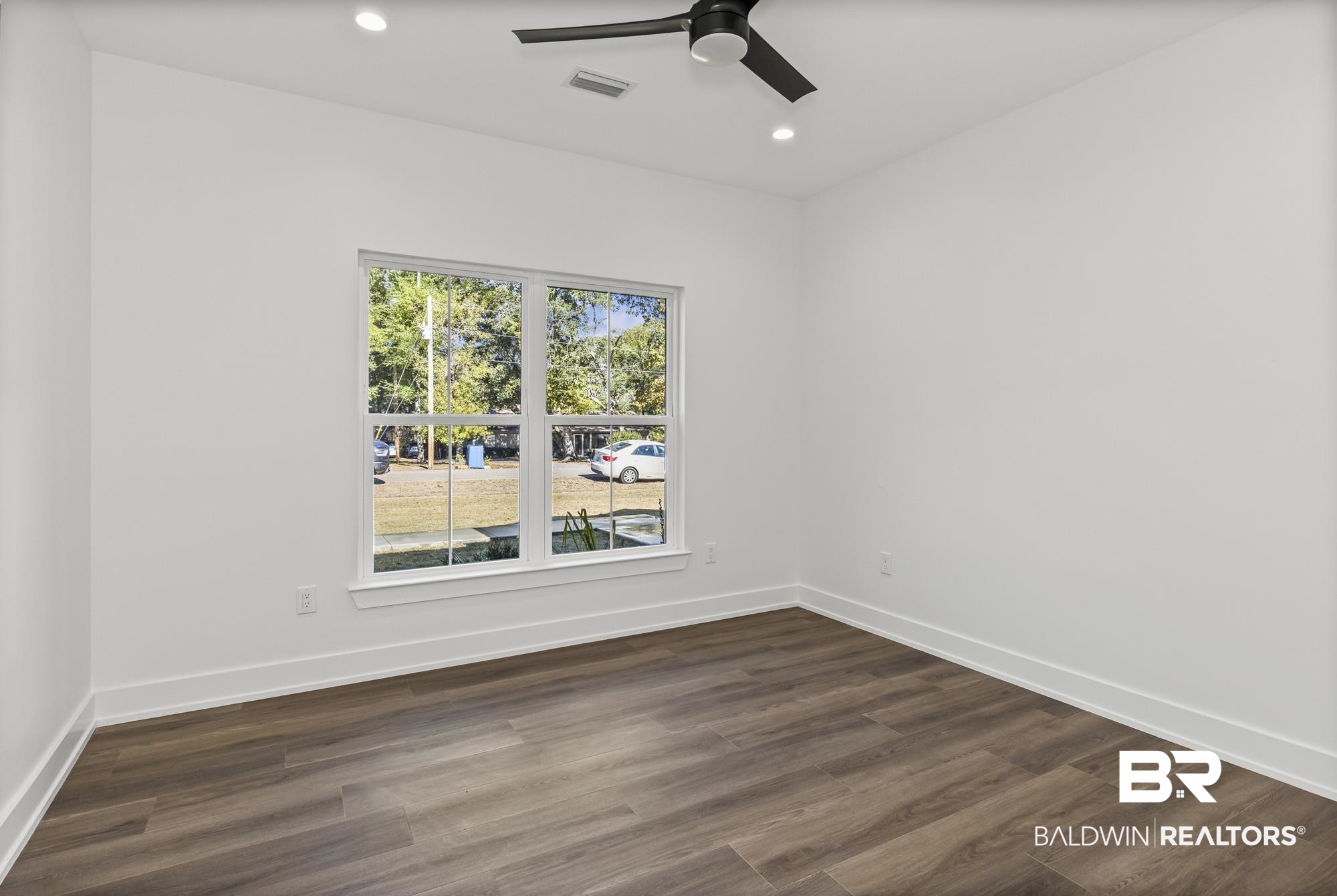 10180 Pineview Drive Foley, AL 36535 - Photo 31 of 47 Unfurnished room featuring dark wood finished floors, ceiling fan, and recessed lighting