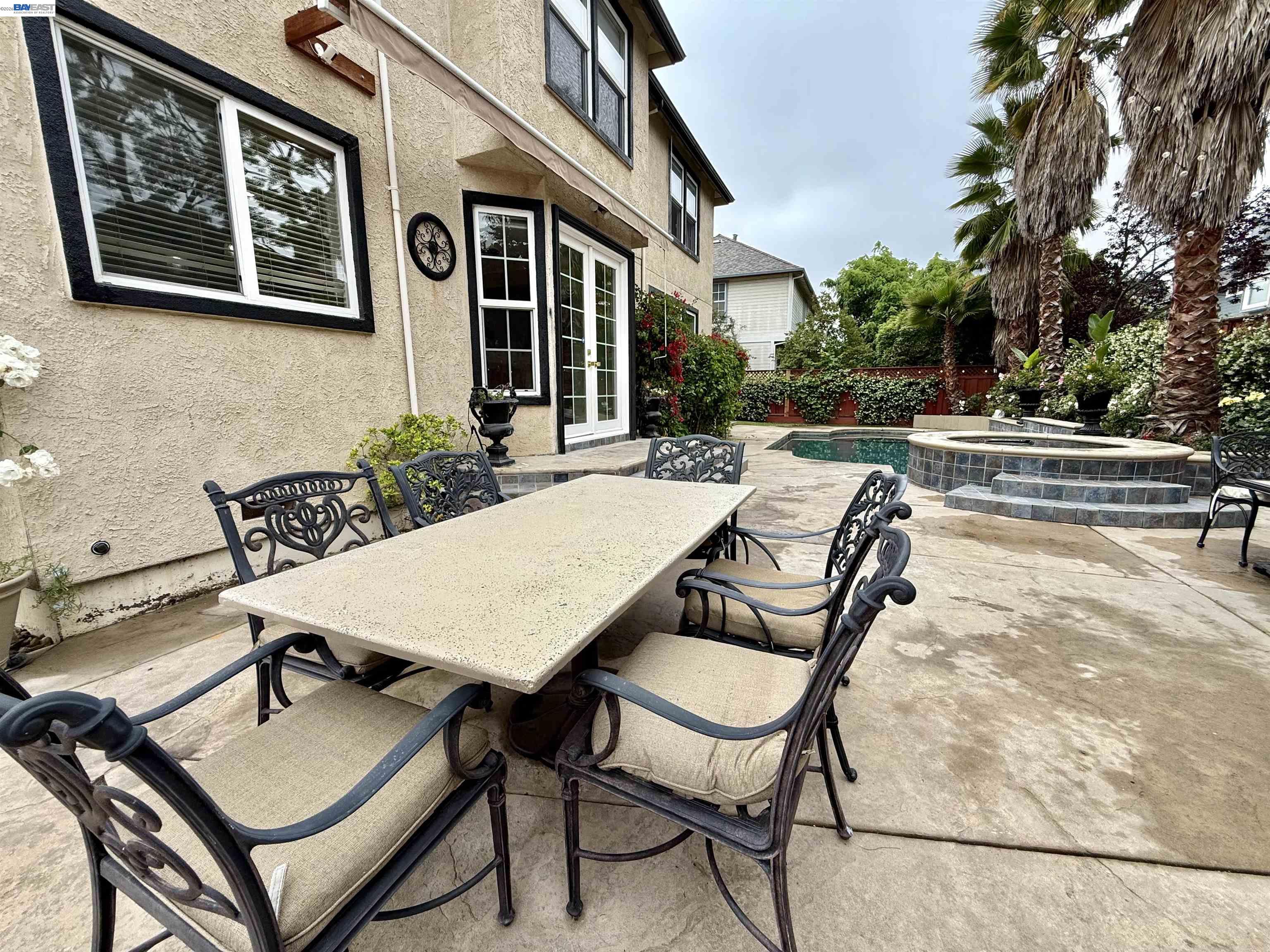 1284 Riesling Circle Livermore, CA 94550 - Photo 72 of 79 a view of a patio with table and chairs and potted plants