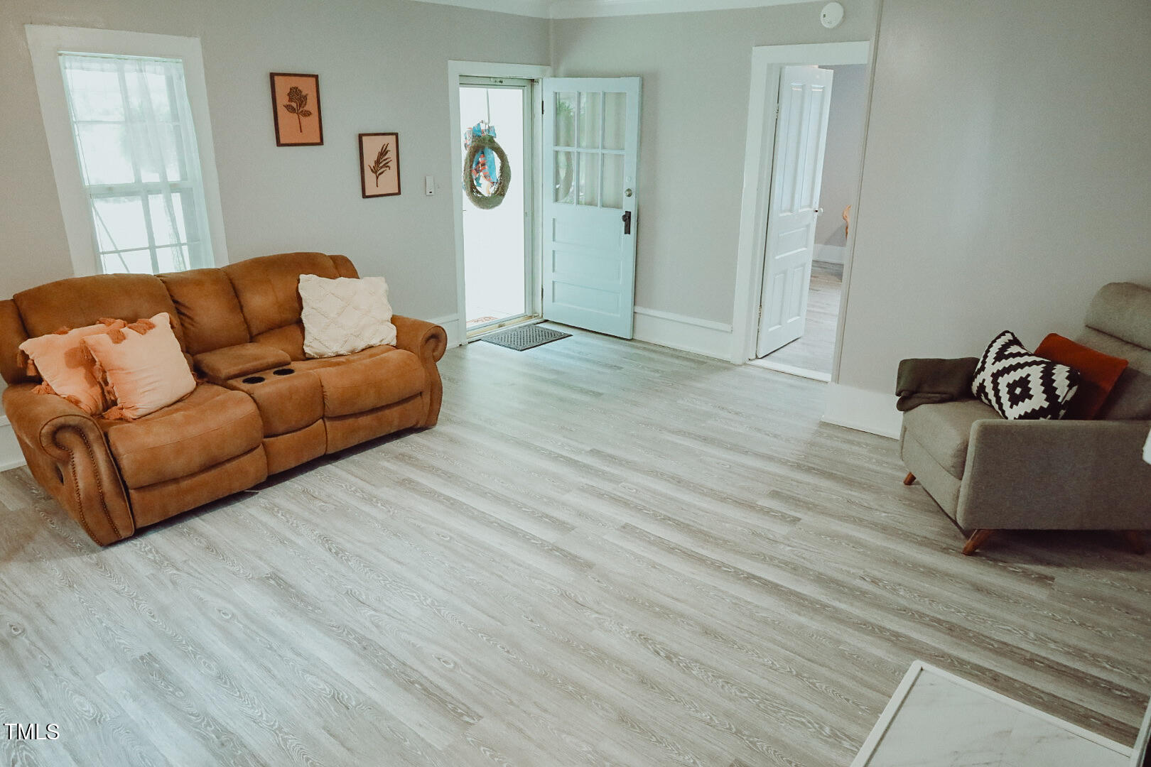 7105 Great Swamp Loop Lucama, NC 27851 - Photo 17 of 65 a living room with furniture and a window