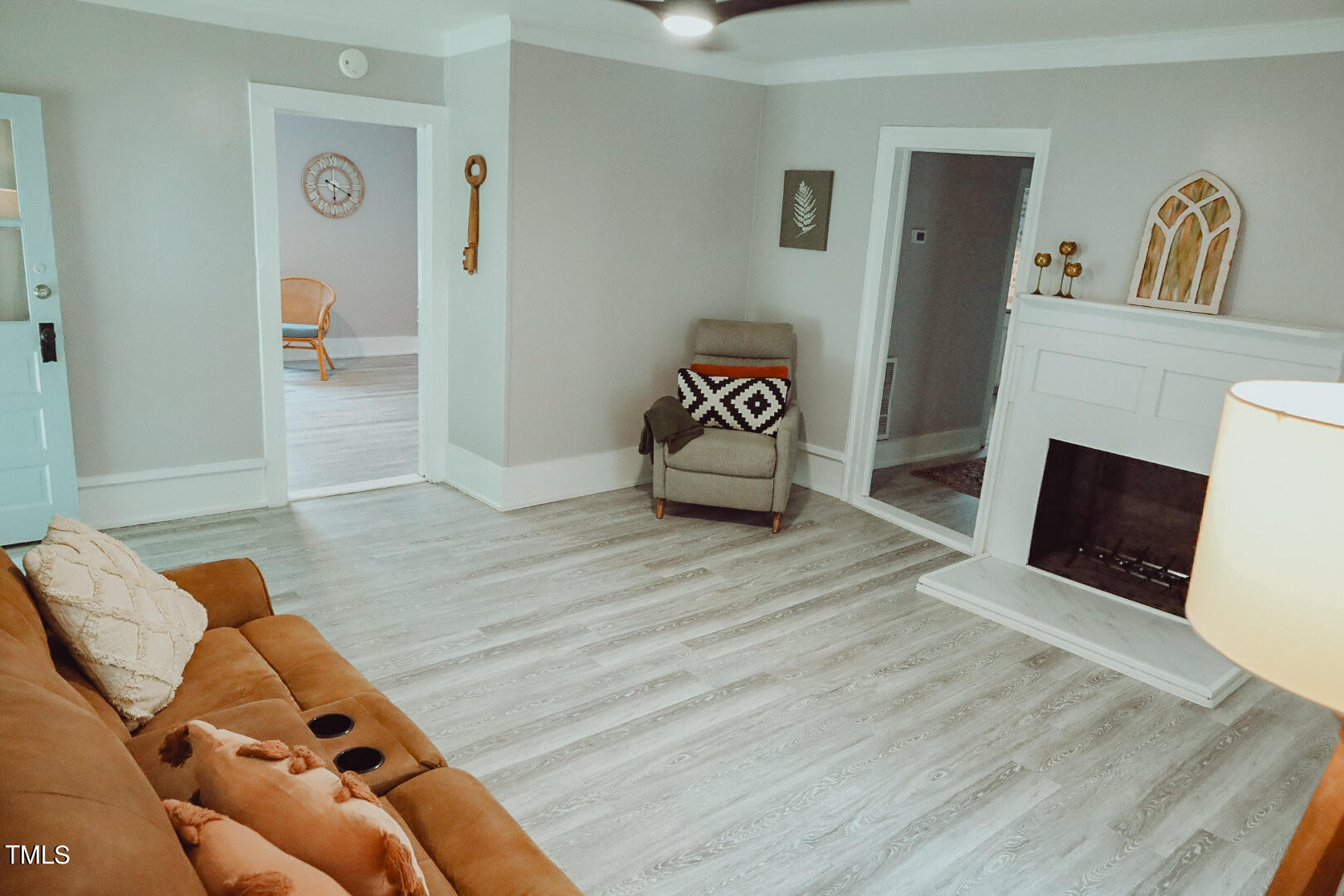 7105 Great Swamp Loop Lucama, NC 27851 - Photo 18 of 65 a room with furniture and wooden floor