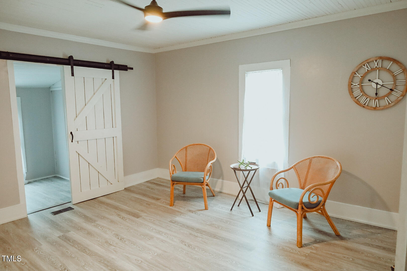7105 Great Swamp Loop Lucama, NC 27851 - Photo 20 of 65 a view of a room with wooden floor table and chairs