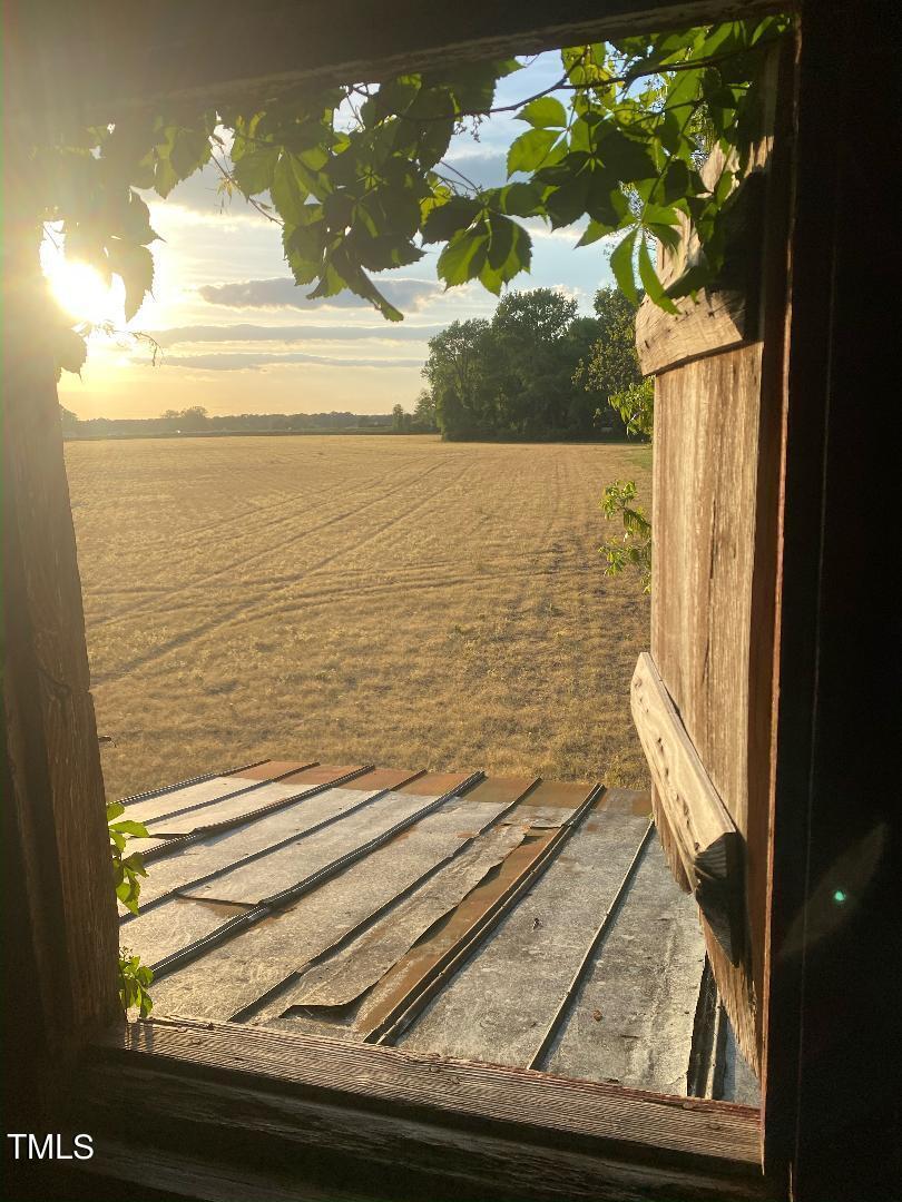 7105 Great Swamp Loop Lucama, NC 27851 - Photo 2 of 65 a view of ocean from a window