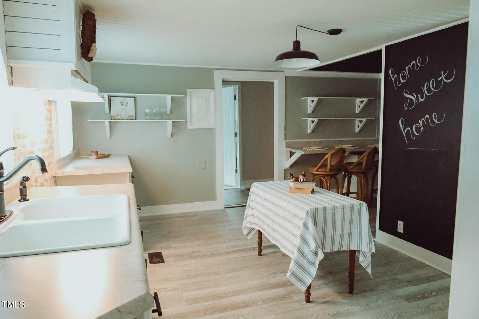 7105 Great Swamp Loop Lucama, NC 27851 - Photo 27 of 65 a bedroom with a bed and a mirror