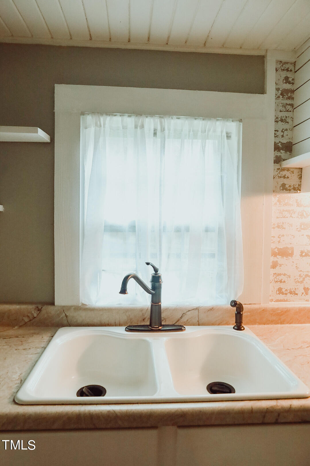 7105 Great Swamp Loop Lucama, NC 27851 - Photo 28 of 65 a view of a sink sitting next to a window