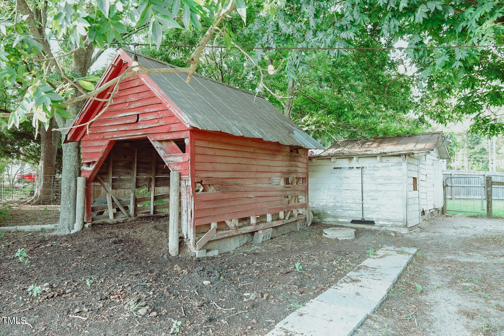7105 Great Swamp Loop Lucama, NC 27851 - Photo 47 of 65 a view of a small house with a yard