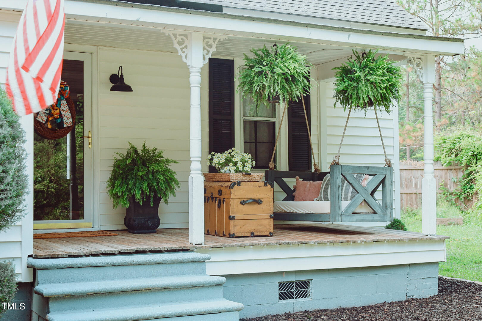 7105 Great Swamp Loop Lucama, NC 27851 - Photo 5 of 65 a view of a potted plants on the side of a building