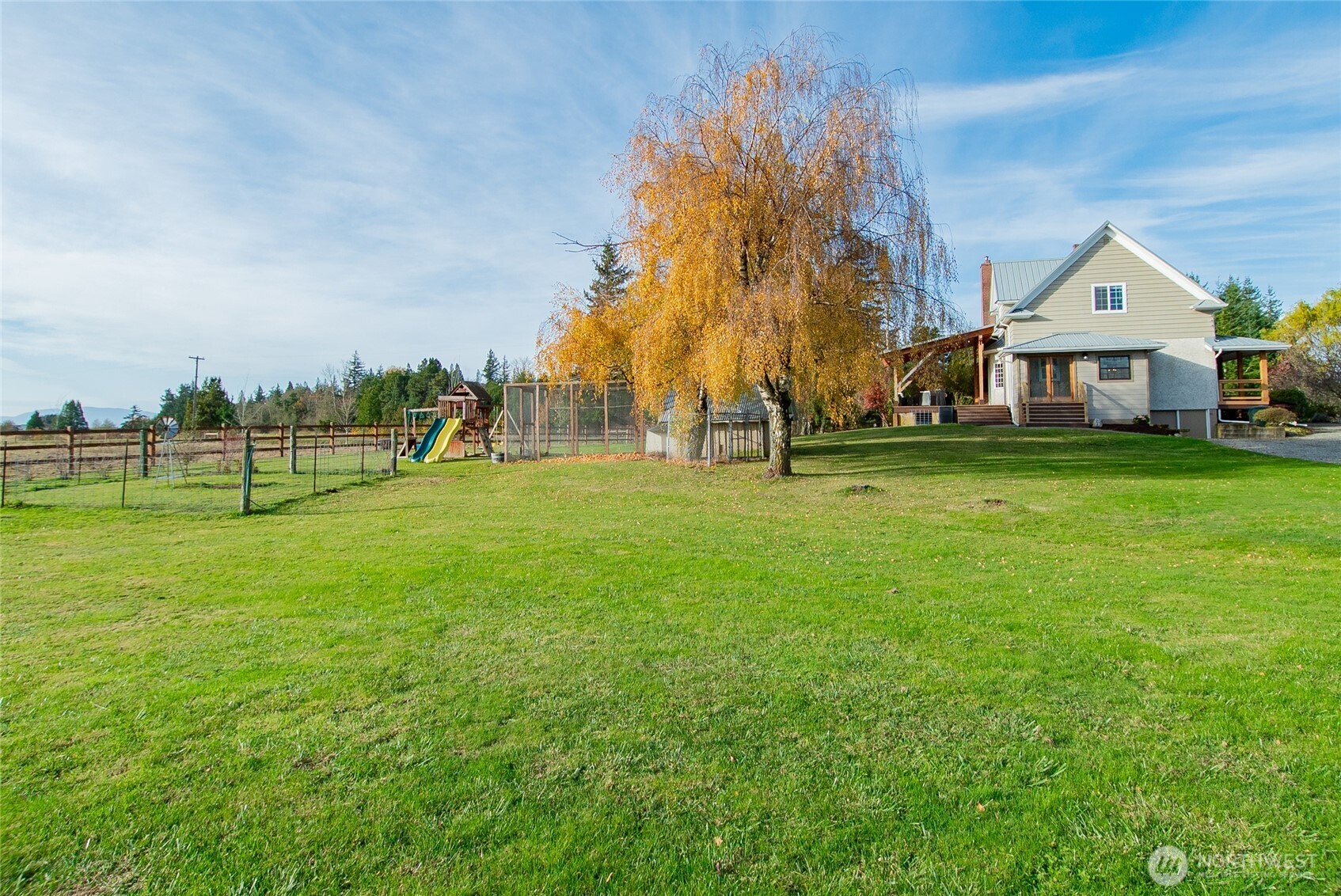 6084 Olson Road Ferndale, WA 98248 - Photo 30 of 40 a view of a house with yard and tree s