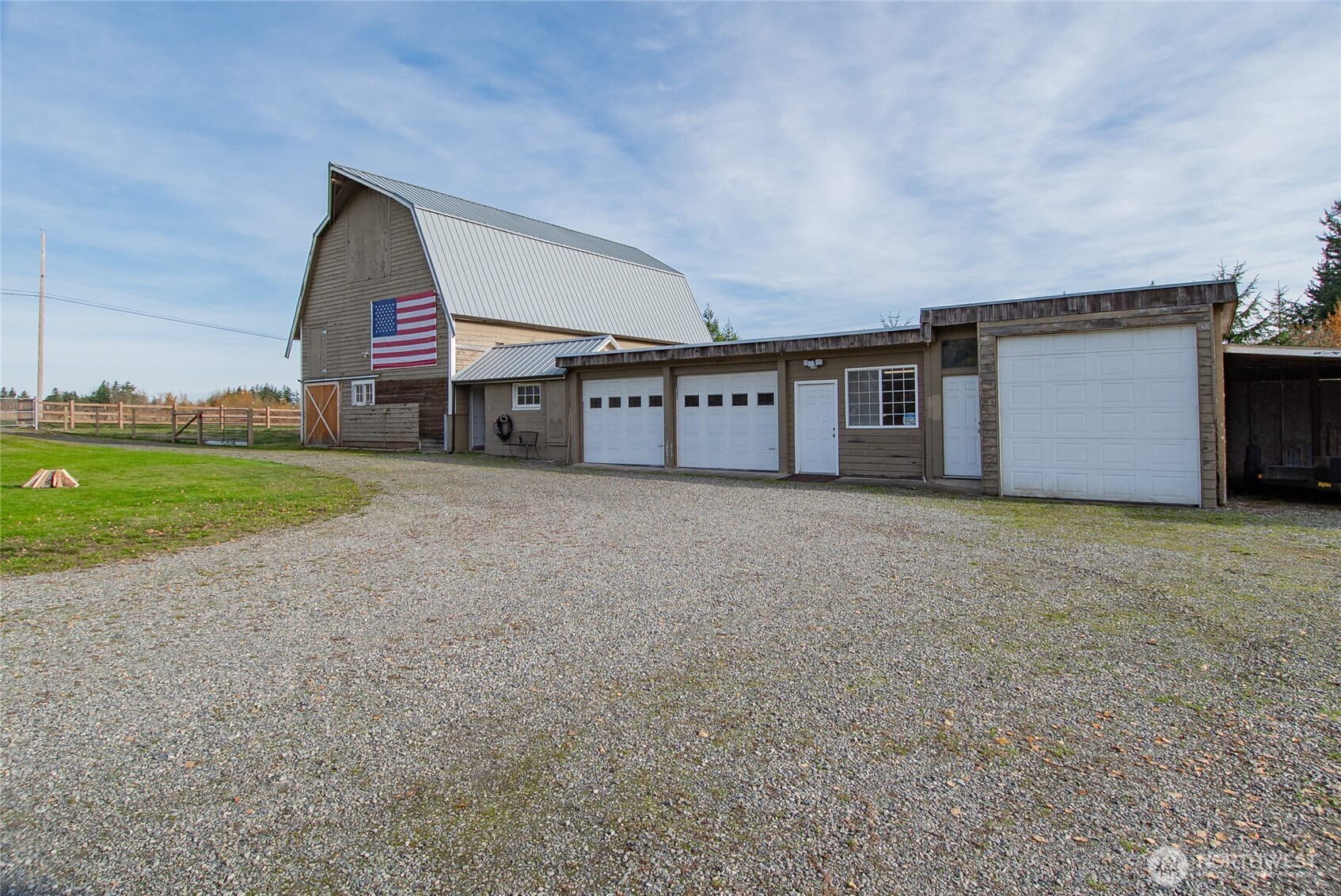 6084 Olson Road Ferndale, WA 98248 - Photo 3 of 40 a view of a house with a yard and garage