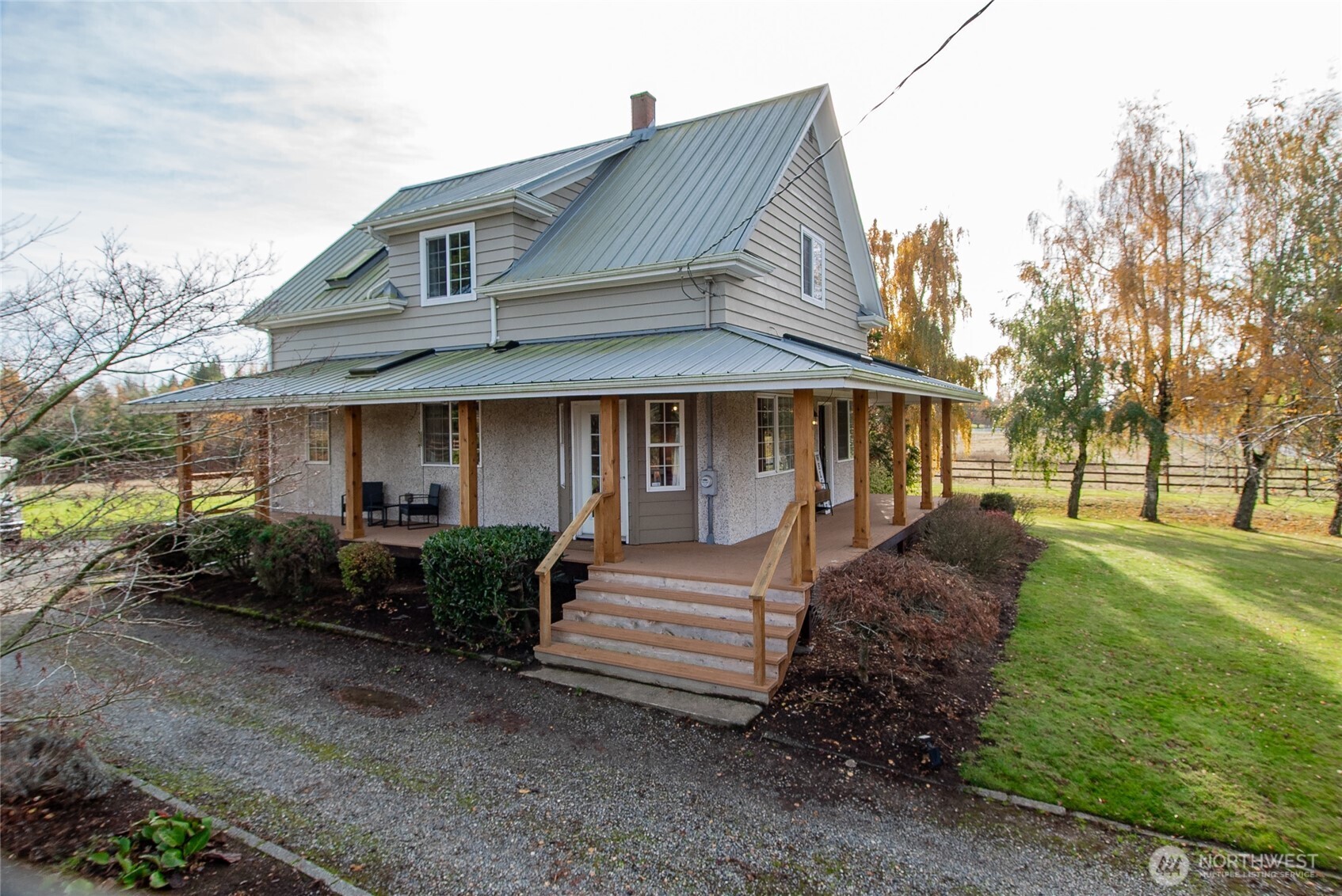 6084 Olson Road Ferndale, WA 98248 - Photo 38 of 40 a front view of a house with garden