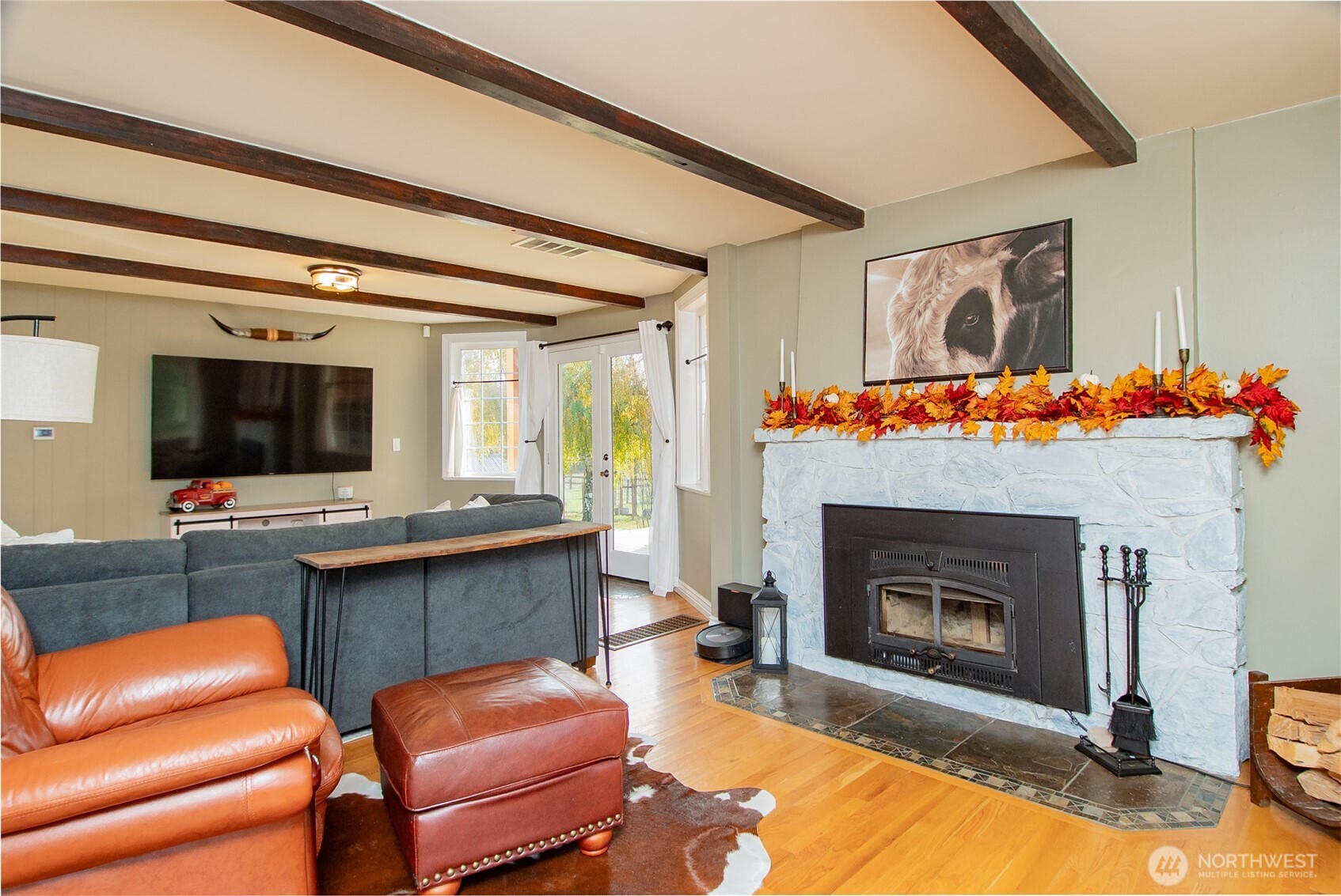 6084 Olson Road Ferndale, WA 98248 - Photo 4 of 40 a living room with furniture and a fireplace
