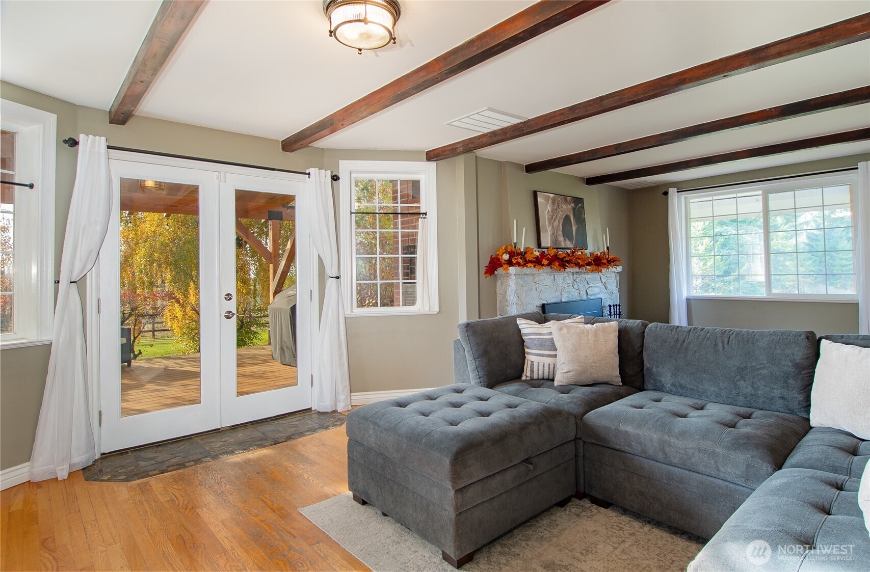 6084 Olson Road Ferndale, WA 98248 - Photo 6 of 40 a living room with furniture and a large window