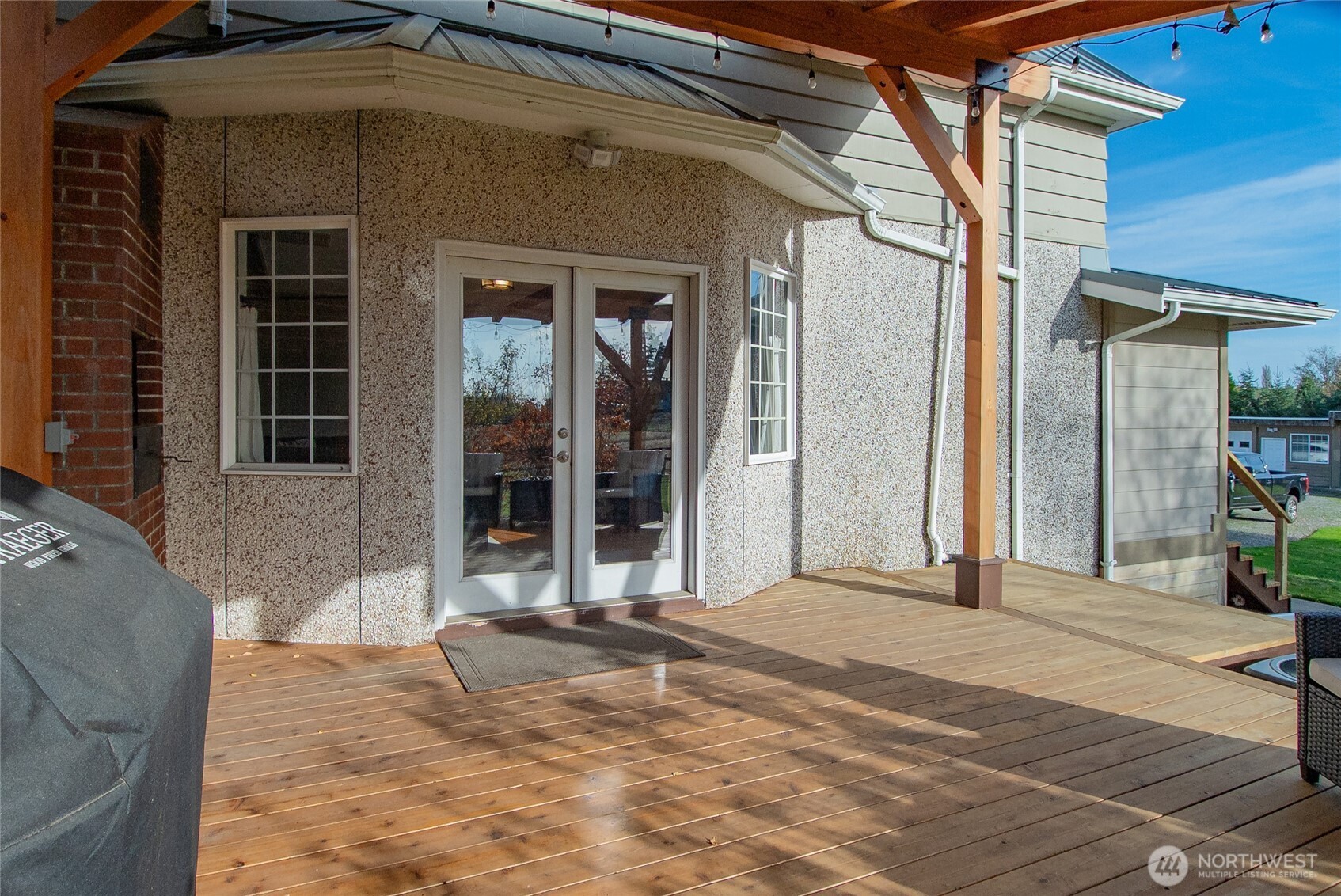 6084 Olson Road Ferndale, WA 98248 - Photo 9 of 40 a front view of a house with a porch