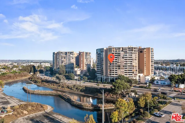 a view of a city with tall buildings