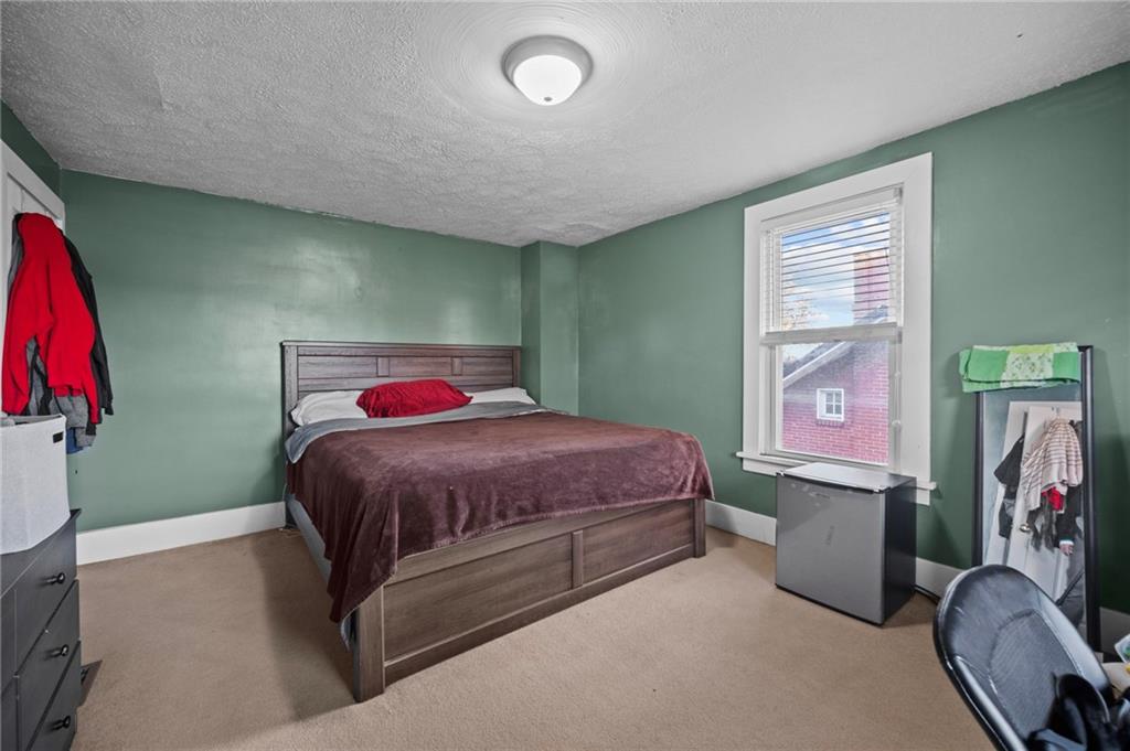 10 Jacquette Place Uniontown, PA 15401 - Photo 20 of 35 a bedroom with a bed and a window