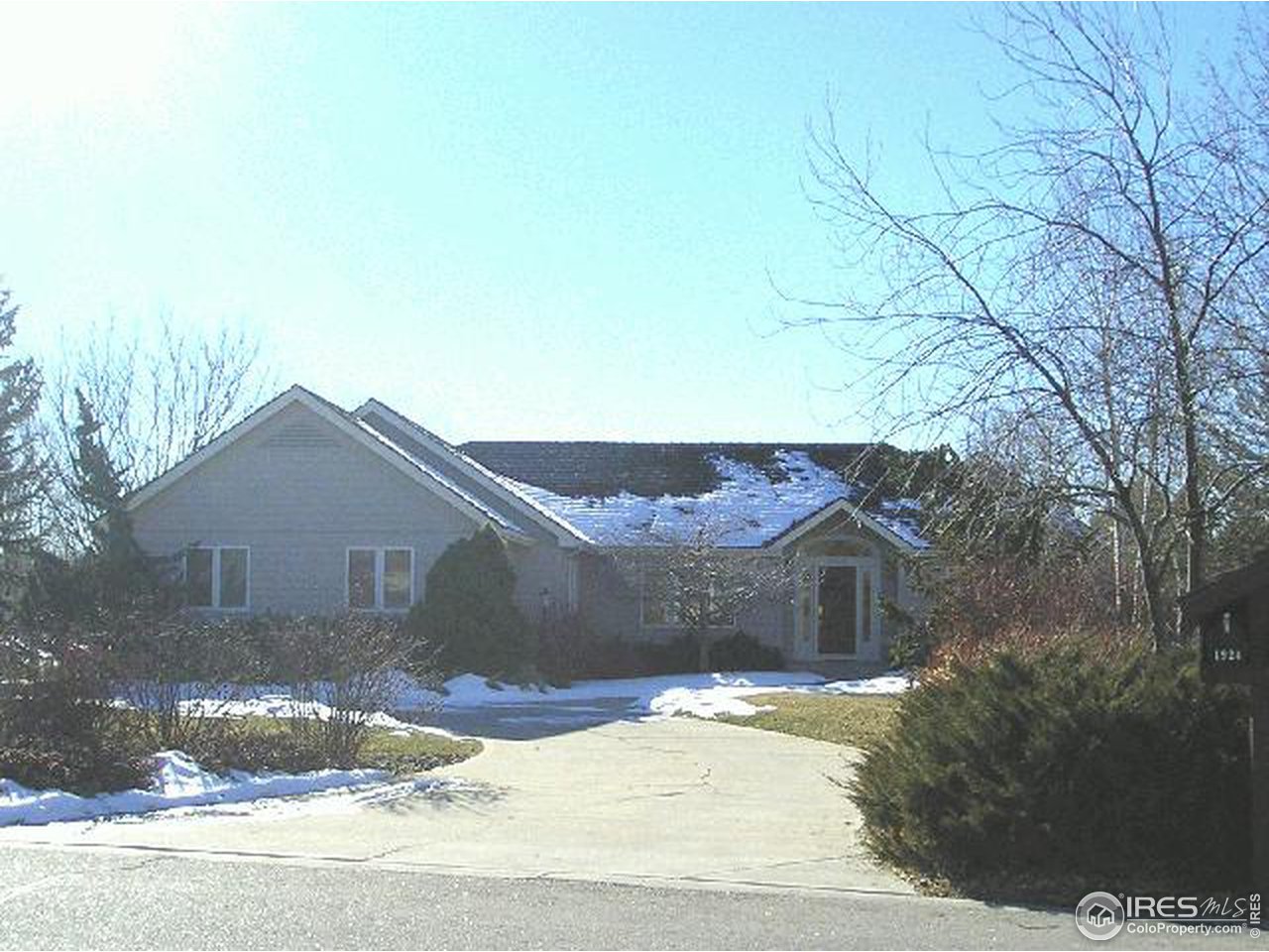 1929 Linden Ridge Drive Fort Collins, CO 80524 - Photo 2 of 6 a front view of a house with a yard