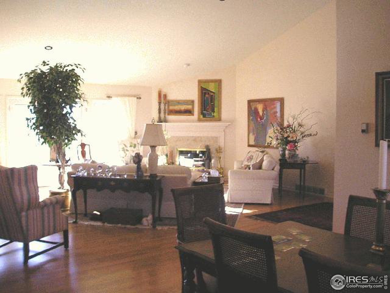 1929 Linden Ridge Drive Fort Collins, CO 80524 - Photo 4 of 6 a dining room with furniture and wooden floor