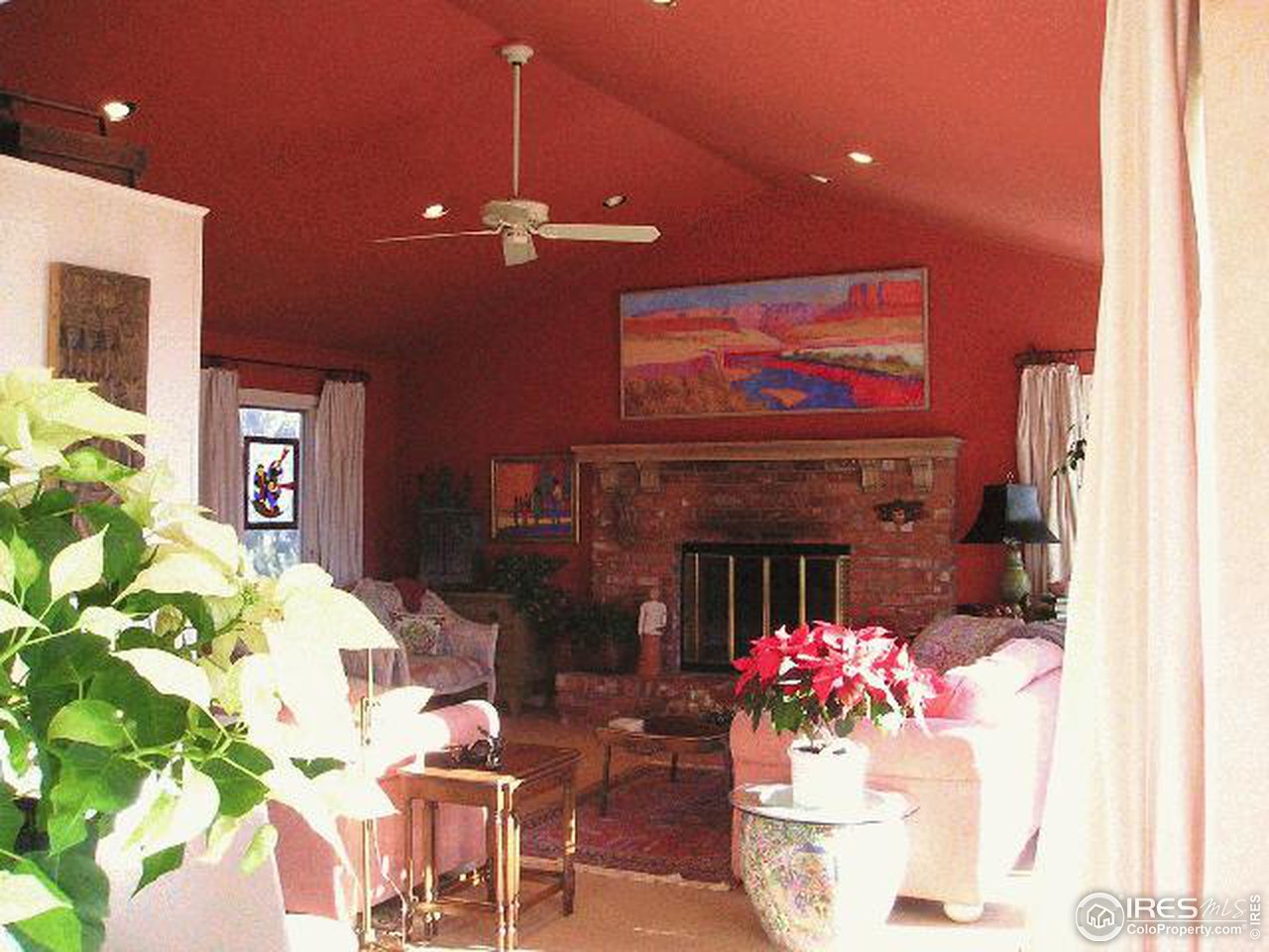 1929 Linden Ridge Drive Fort Collins, CO 80524 - Photo 6 of 6 a living room with furniture and a fireplace