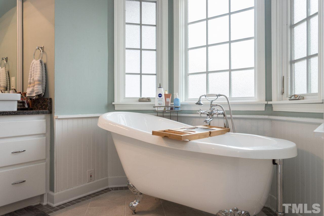 7505 Penny Road Raleigh, NC 27606 - Photo 20 of 25 a bathroom with a sink and a window