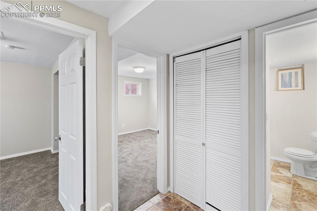 4127 Bent Drive Colorado Springs, CO 80909 - Photo 28 of 41 a view of a bathroom from the hallway