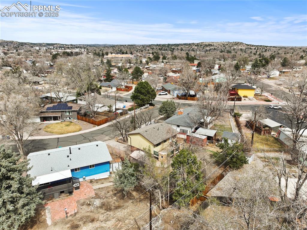 4127 Bent Drive Colorado Springs, CO 80909 - Photo 34 of 41 an aerial view of residential houses with outdoor space