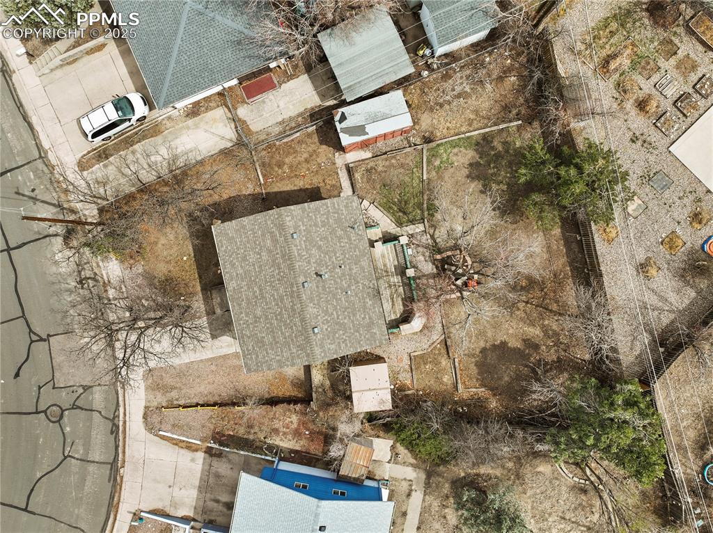 4127 Bent Drive Colorado Springs, CO 80909 - Photo 40 of 41 view of a house with a yard