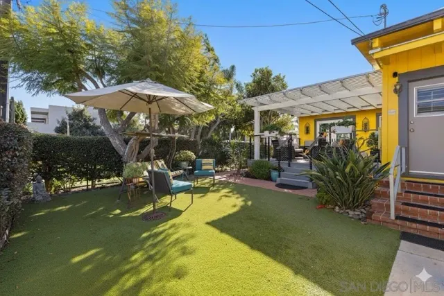 a outdoor living space with furniture and wooden floor