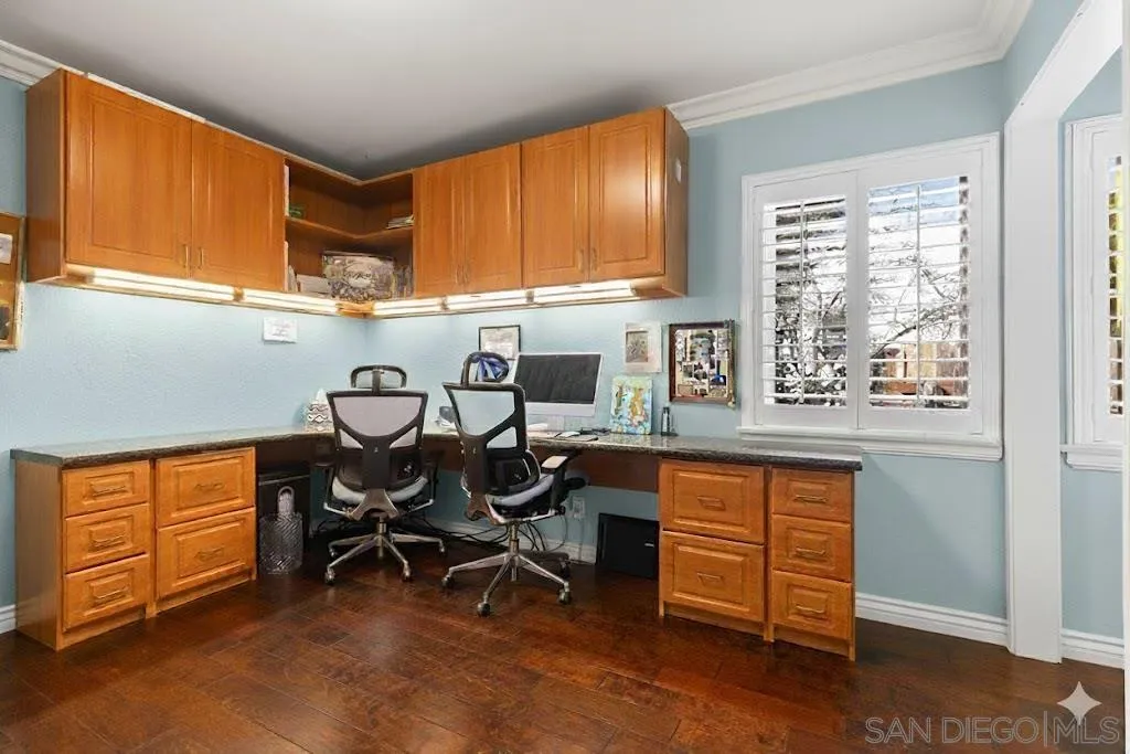 2038 South Freeman Street Oceanside, CA 92054 - Photo 15 of 23 a view of a kitchen with table and chairs