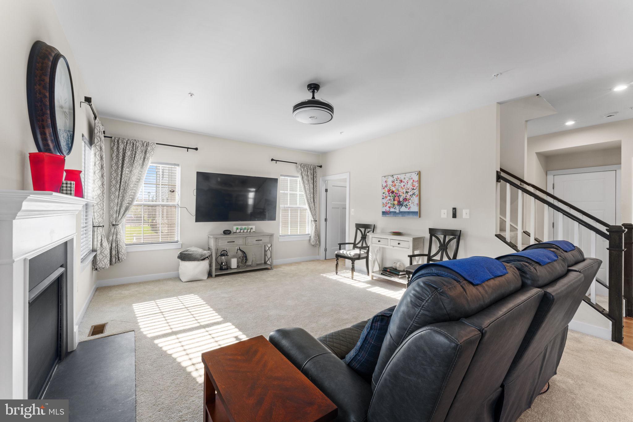 8003 Trimbles Ford Lane Brandywine, MD 20613 - Photo 18 of 70 a living room with furniture and a flat screen tv