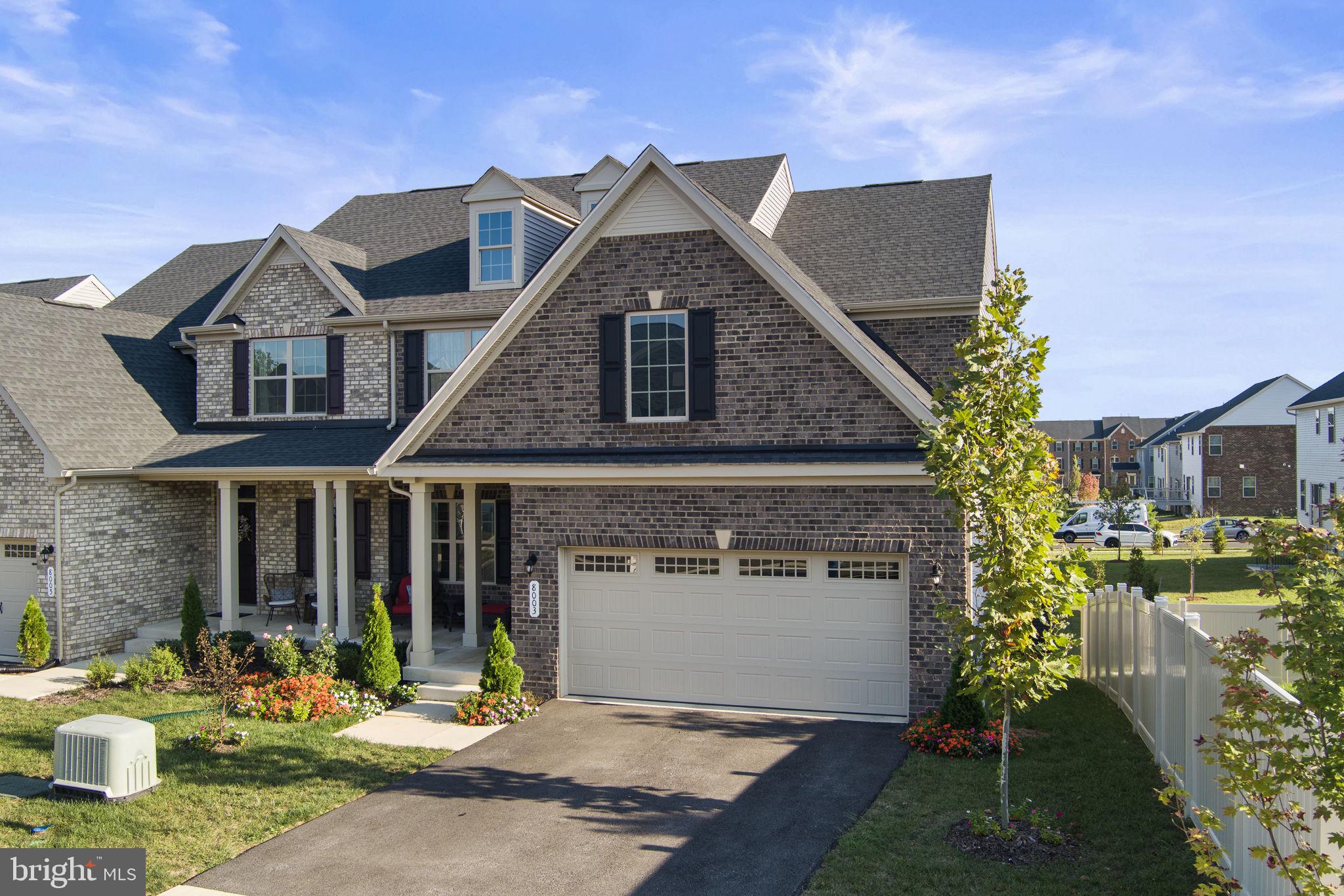 8003 Trimbles Ford Lane Brandywine, MD 20613 - Photo 2 of 70 a front view of a house with a yard
