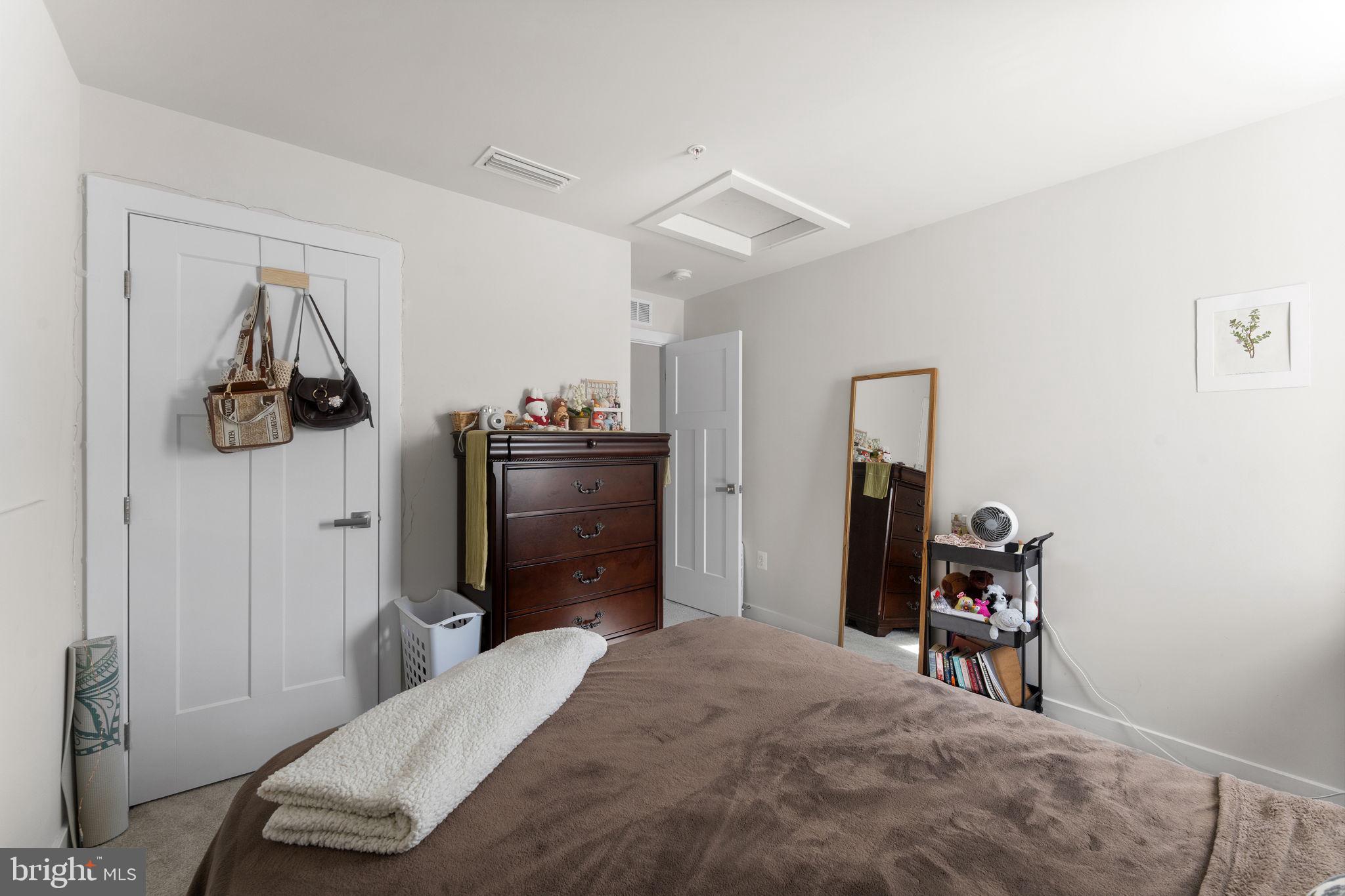 8003 Trimbles Ford Lane Brandywine, MD 20613 - Photo 26 of 70 a bedroom with a bed and a walk in closet